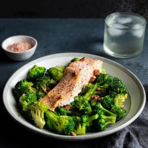 a prepared keto meal with salmon and broccoli from Fresh N Lean