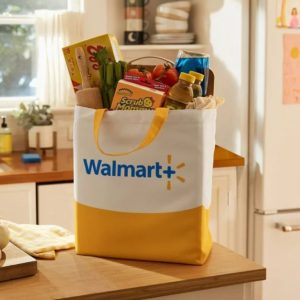 A bag filled with groceries with the Walmart+ logo.