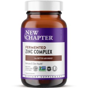 A brown glass bottle with a white cap labeled "Fermented Zinc Complex" by New Chapter.