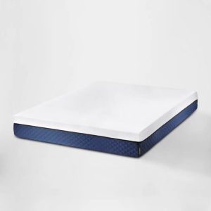 Sleek mattress with white top and dark blue sides, showcased in a minimalistic setting against a white background