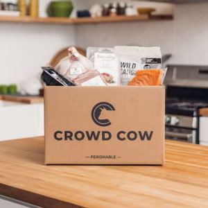 the meat delivery box from crowd cow full of meat on a kitchen counter