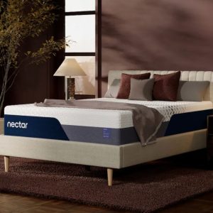 Nectar mattress in a cozy bedroom with soft lighting and plush pillows.