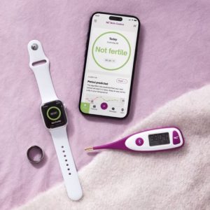 Natural Cycles fertility app with smartwatch and thermometer integration for tracking ovulation and fertility status.