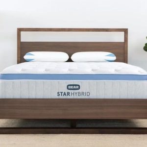 Bear Star Hybrid mattress in stylish bedroom with wood accents