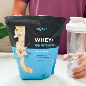 Tester evaluating Legion Athletics Whey+ protein powder.