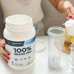 Tester scooping Transparent Labs Whey Protein Isolate.