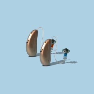 Audicus Wave hearing aids on light blue background