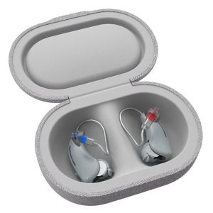 Rechargeable hearing aids in a compact charging case with blue and red indicators